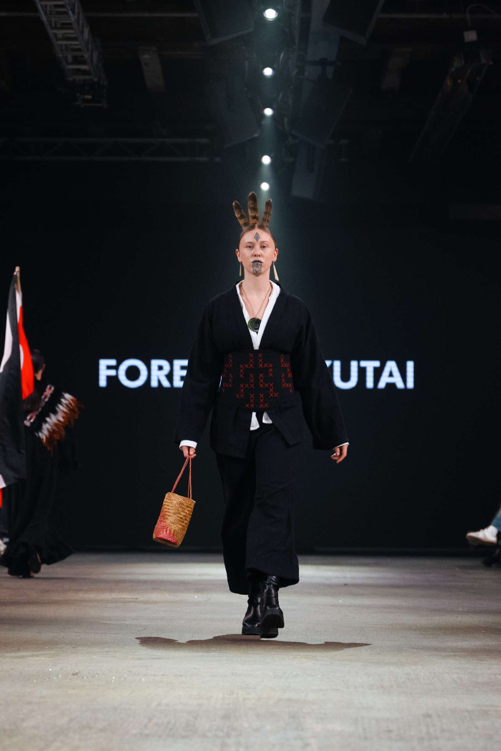 Model walks down runway