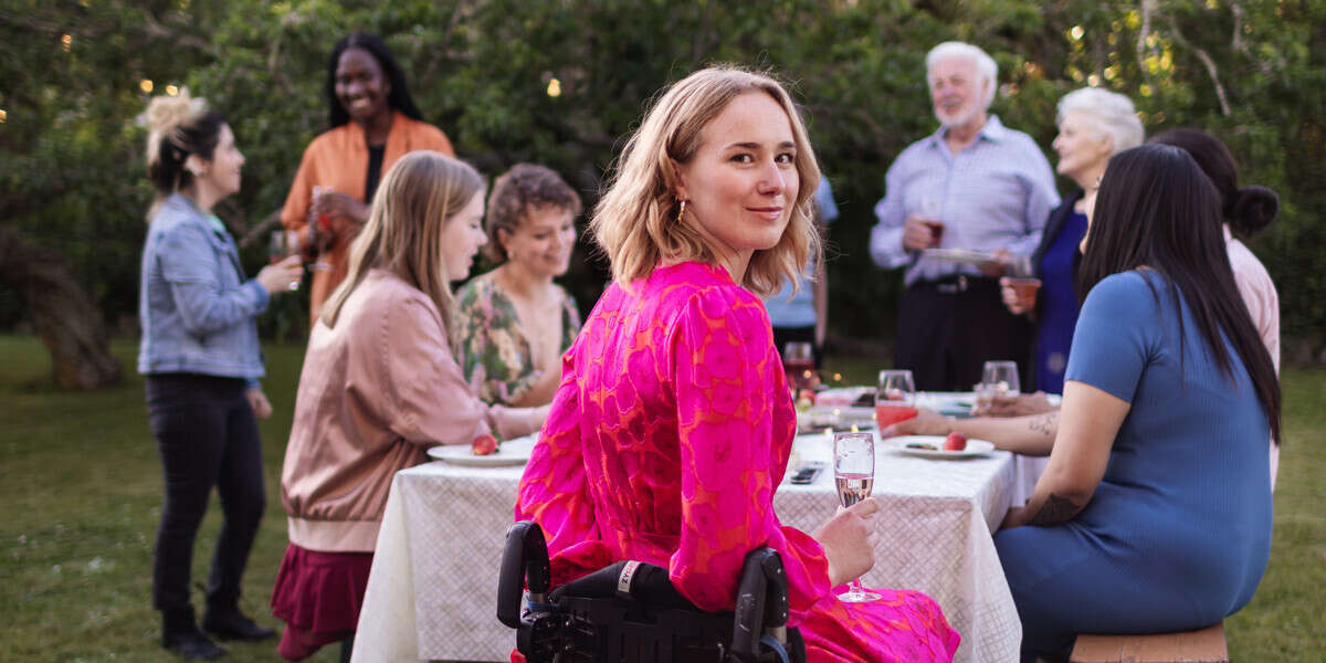 Pieta in pink looking over shoulder