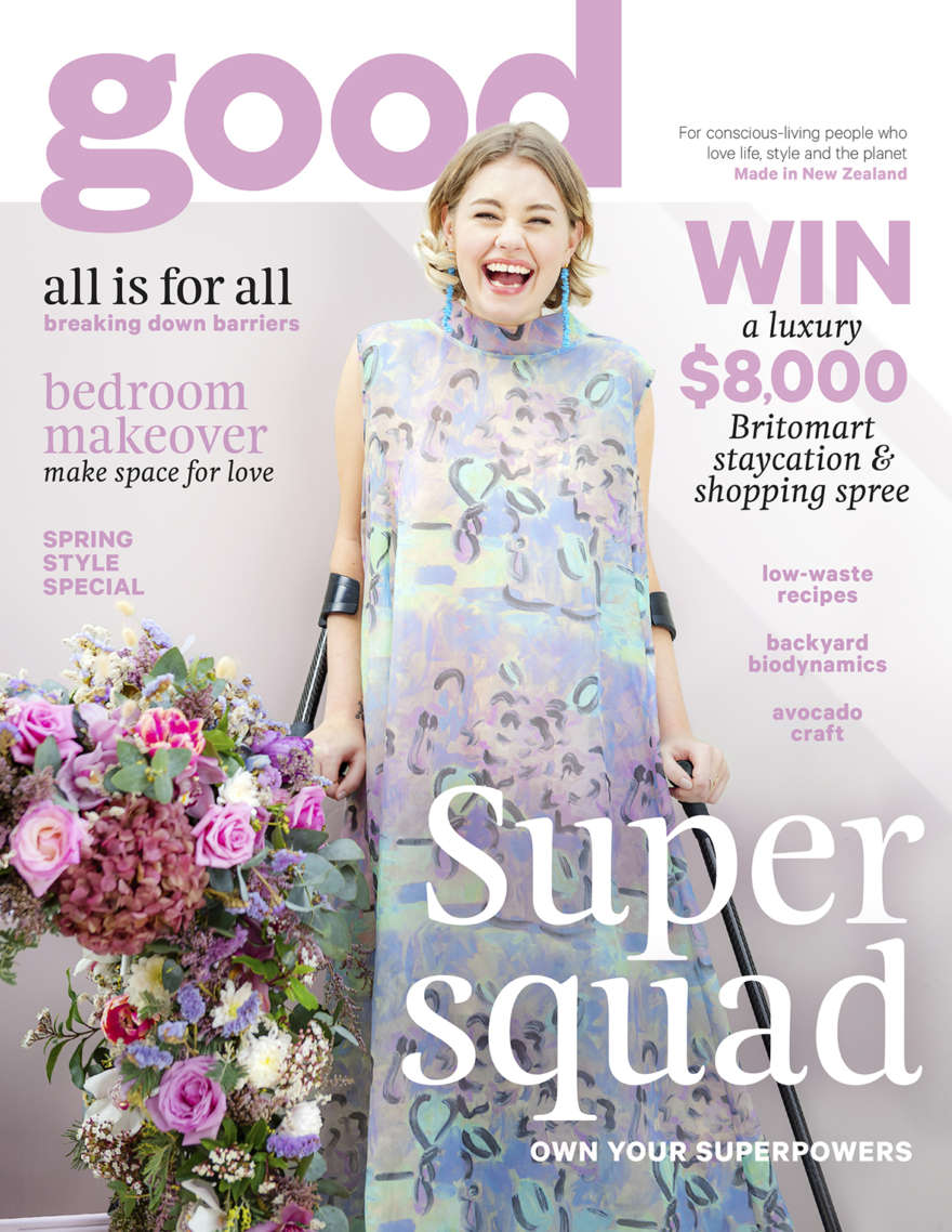 Magazine cover with Hannah in florals on the front, she has crutches and looks at the camera smiling.
